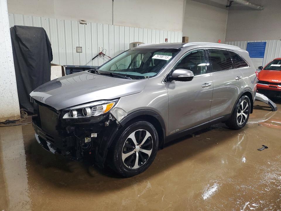 KIA SORENTO 2016 with VIN 5XYPHDA54GG021527 - Photo from auction