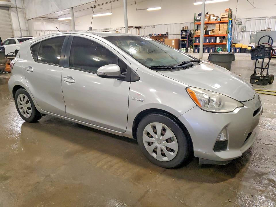 Photo 4 from auction – 2013 TOYOTA PRIUS C with VIN JTDKDTB34D1541039