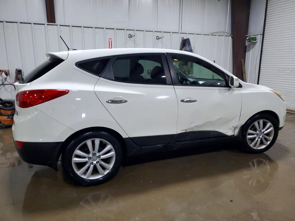 Photo 3 from auction – 2012 HYUNDAI TUCSON with VIN KM8JUCAC0CU454230