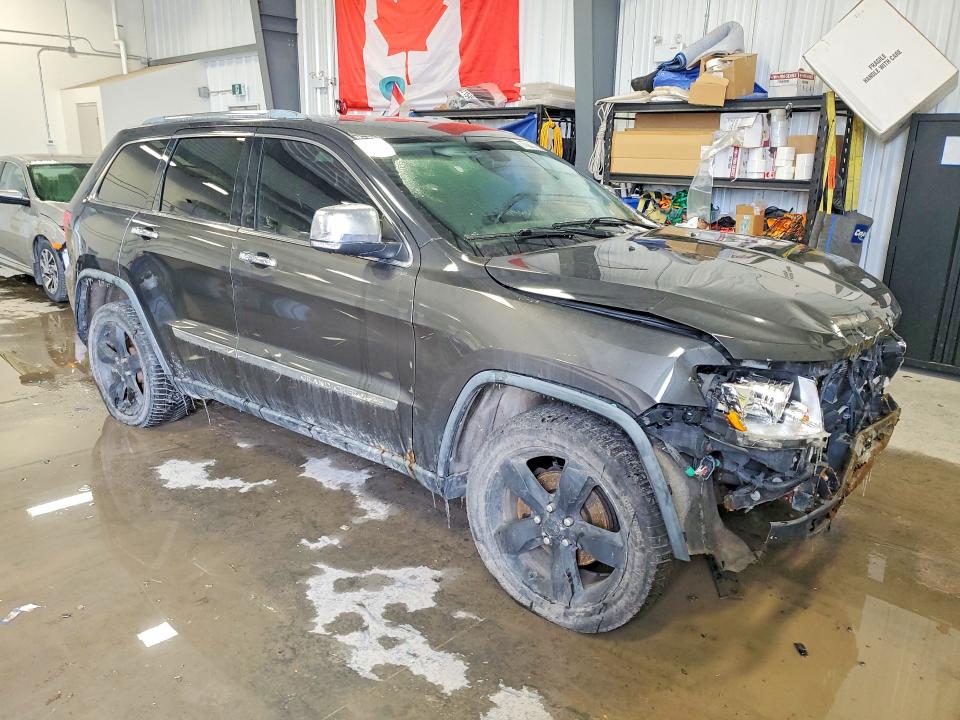 Photo 4 from auction – 2011 JEEP GRAND CHEROKEE with VIN 1J4RR5GG3BC581972