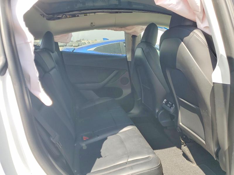 Photo 11 from auction – 2022 TESLA MODEL Y with VIN 7SAYGDEE9NF560508