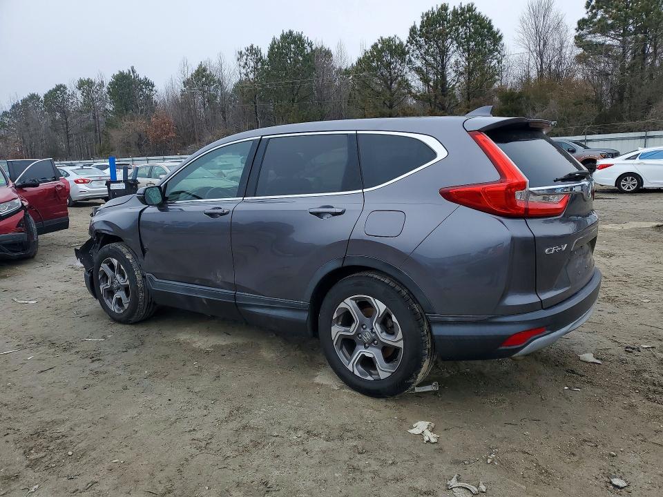 Photo 2 from auction – 2017 HONDA CR-V with VIN 7FARW1H5XHE011150