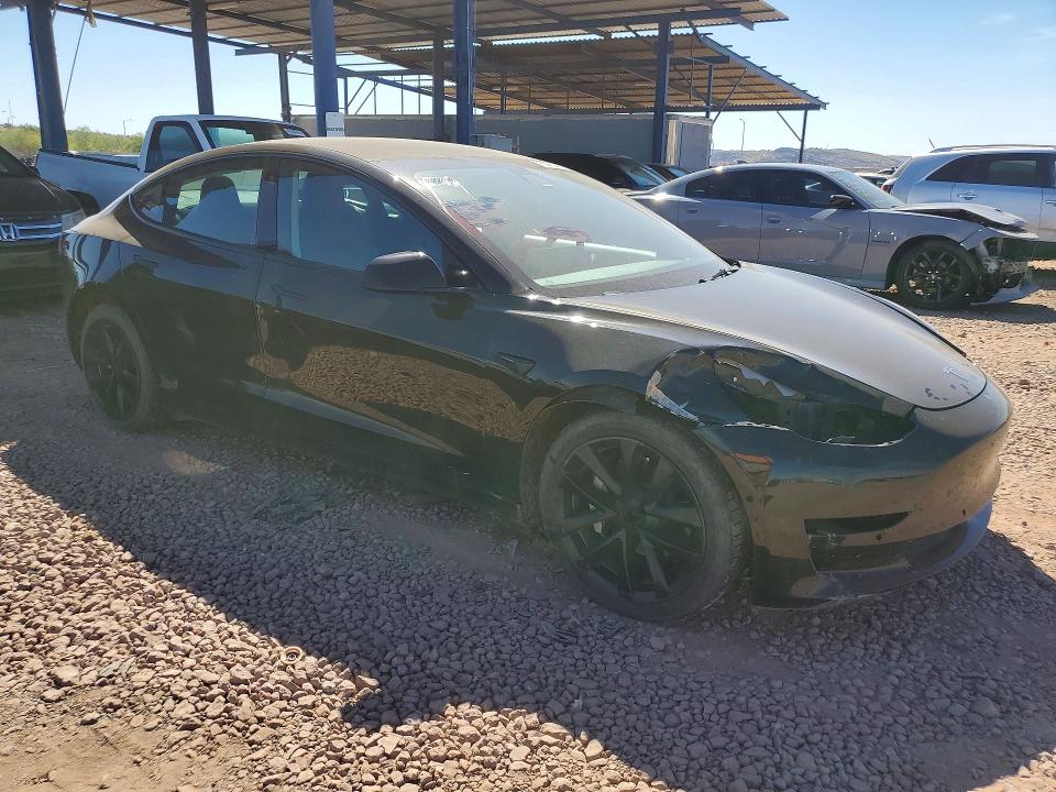 Photo 4 from auction – 2021 TESLA MODEL 3 with VIN 5YJ3E1EB7MF098532