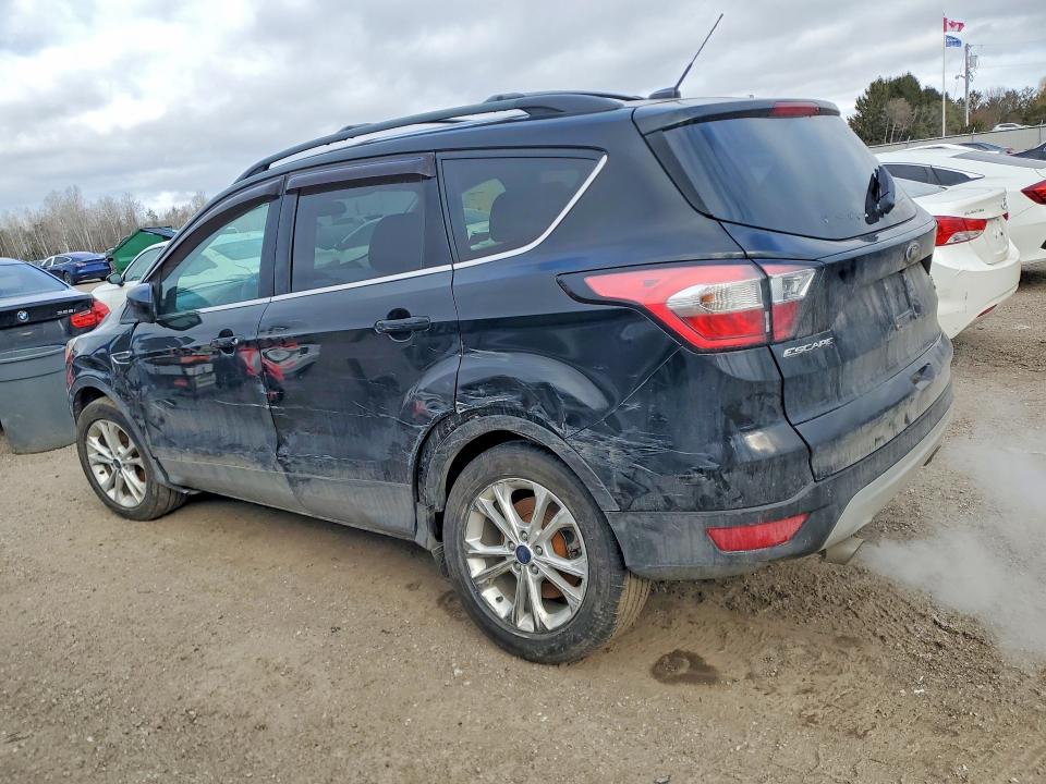 Photo 2 from auction – 2017 FORD ESCAPE with VIN 1FMCU9G9XHUA16796