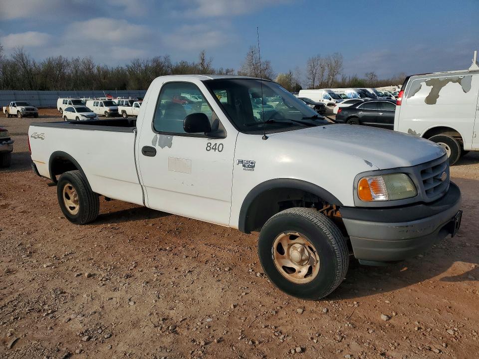Photo 4 from auction – 2002 FORD F150 with VIN 3FTRF18WX2MA18140