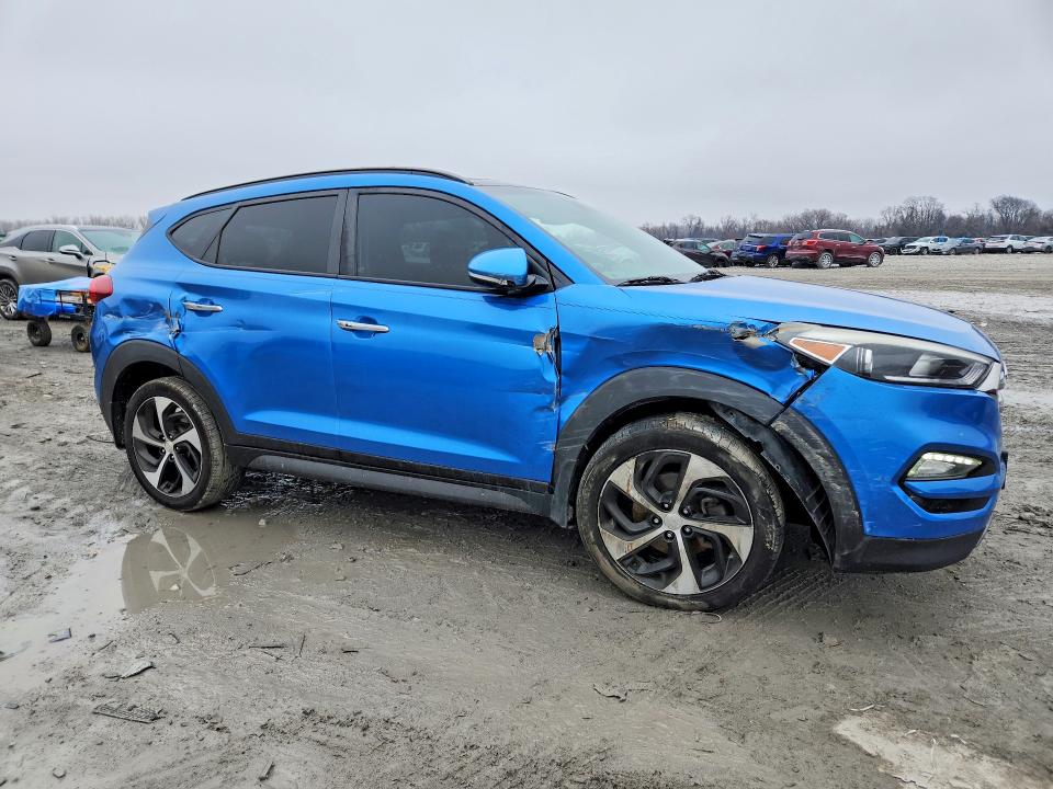 Photo 4 from auction – 2016 HYUNDAI TUCSON with VIN KM8J33A22GU152681