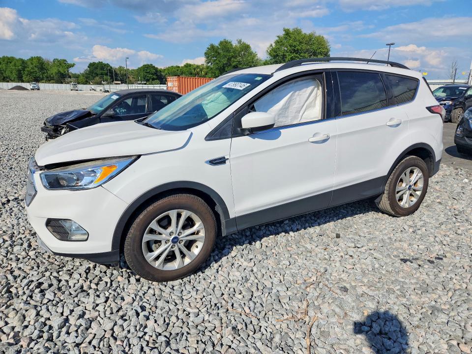 FORD ESCAPE 2018 with VIN 1FMCU0GD5JUD47467 - Photo from auction