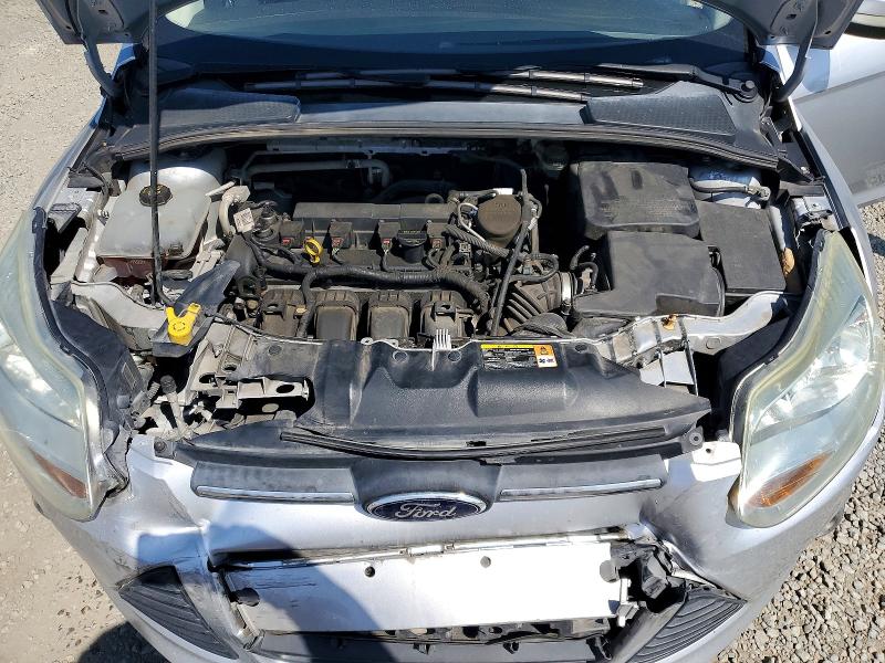 Photo 11 from auction – 2014 FORD FOCUS with VIN 1FADP3F22EL143812