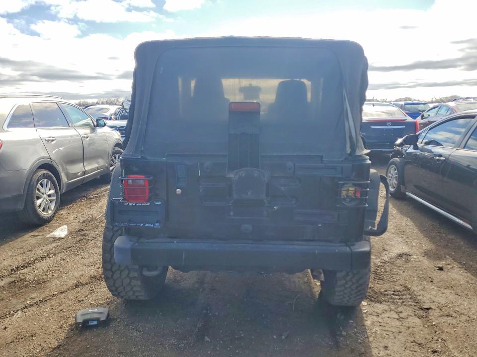 Photo 6 from auction – 2004 JEEP WRANGLER / TJ with VIN 1J4FA49S84P801236