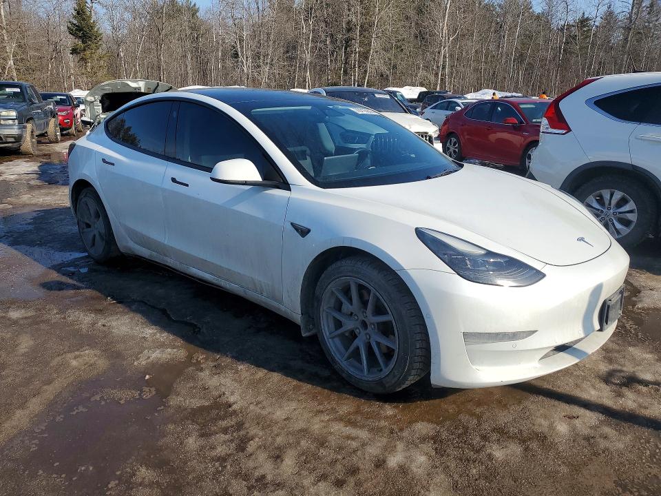 Photo 4 from auction – 2022 TESLA MODEL 3 with VIN 5YJ3E1EA1NF151556