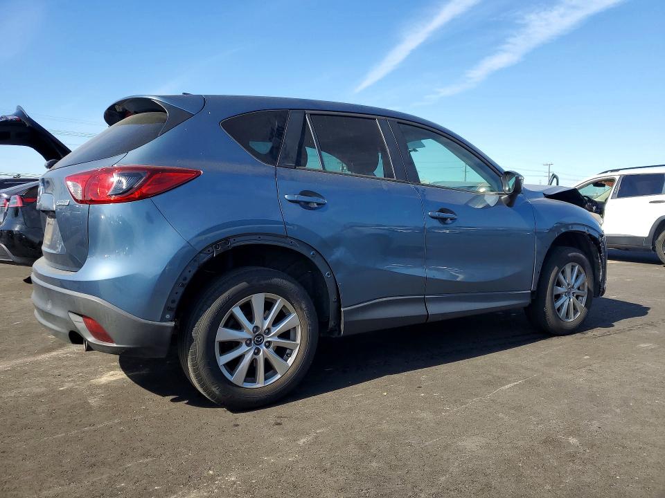 Photo 3 from auction – 2016 MAZDA CX-5 with VIN JM3KE2CY6G0787304