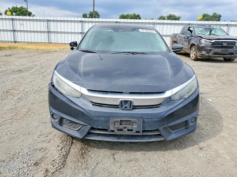 Photo 5 from auction – 2016 HONDA CIVIC with VIN 19XFC1F90GE211794