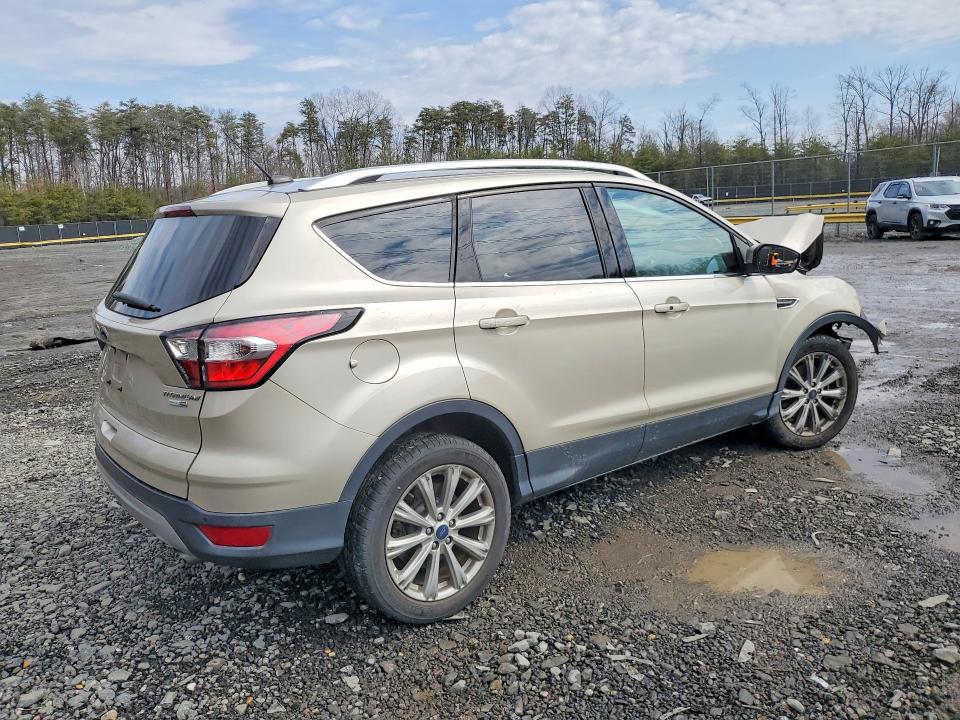 Photo 3 from auction – 2017 FORD ESCAPE with VIN 1FMCU9JD4HUD82072