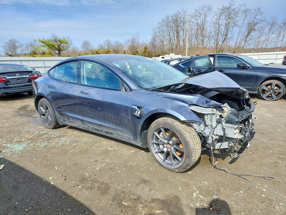 Снимка 4 от търг – 2023 TESLA MODEL 3 с VIN 5YJ3E1EA1PF626531