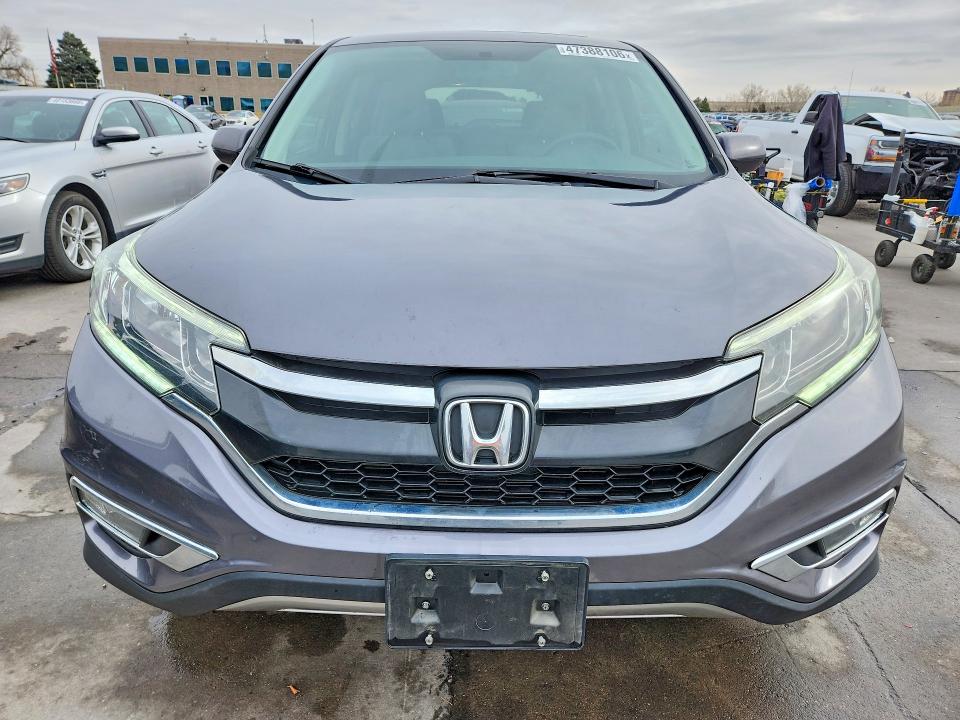 Photo 5 from auction – 2015 HONDA CR-V with VIN 2HKRM4H5XFH702292