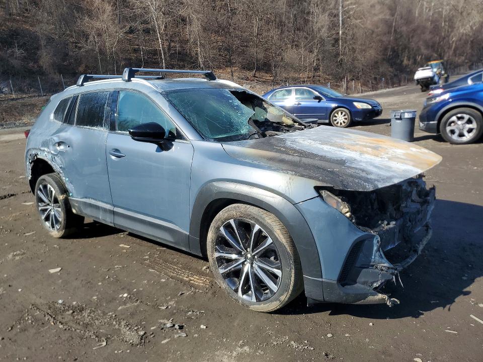 Photo 4 from auction – 2023 MAZDA CX-50 with VIN 7MMVABEM5PN102806
