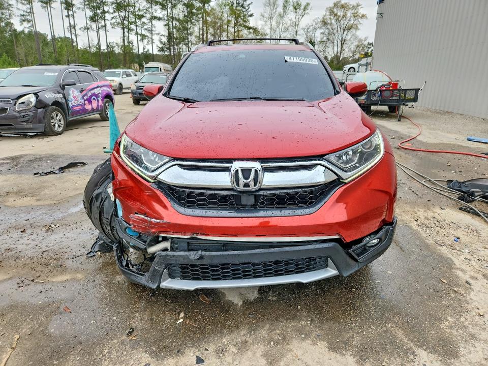Photo 5 from auction – 2017 HONDA CR-V with VIN 5J6RW2H50HL070992