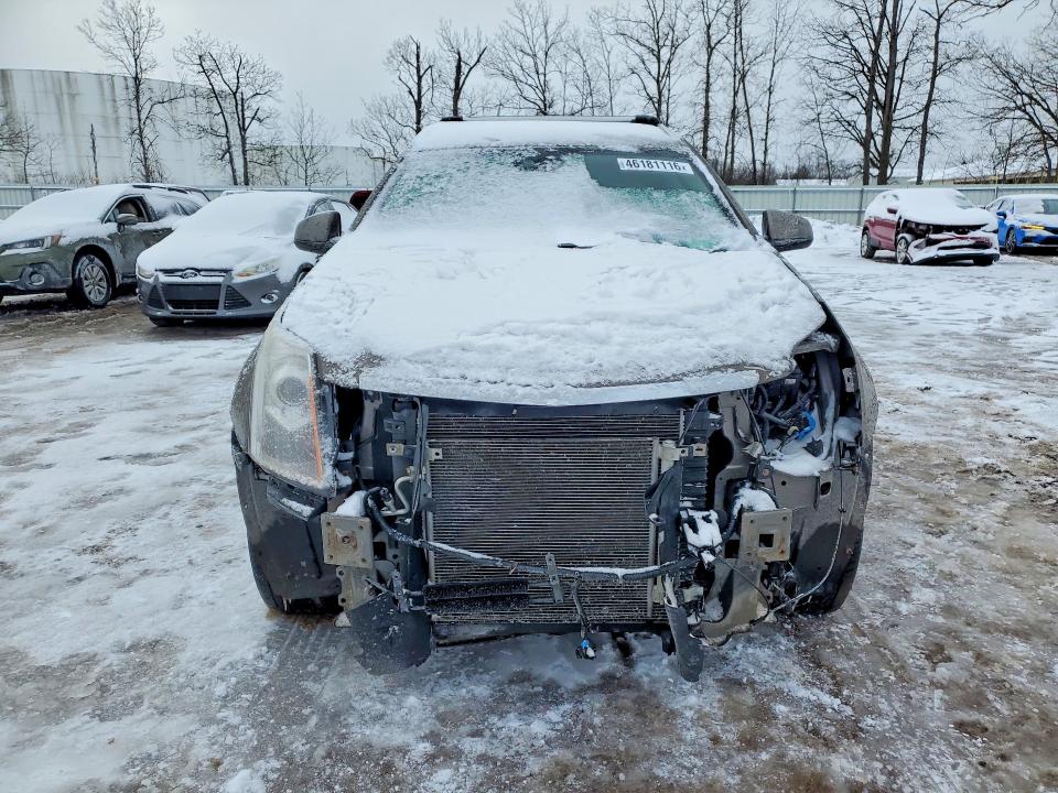 Photo 5 from auction – 2014 CADILLAC SRX with VIN 3GYFNGE38ES565355