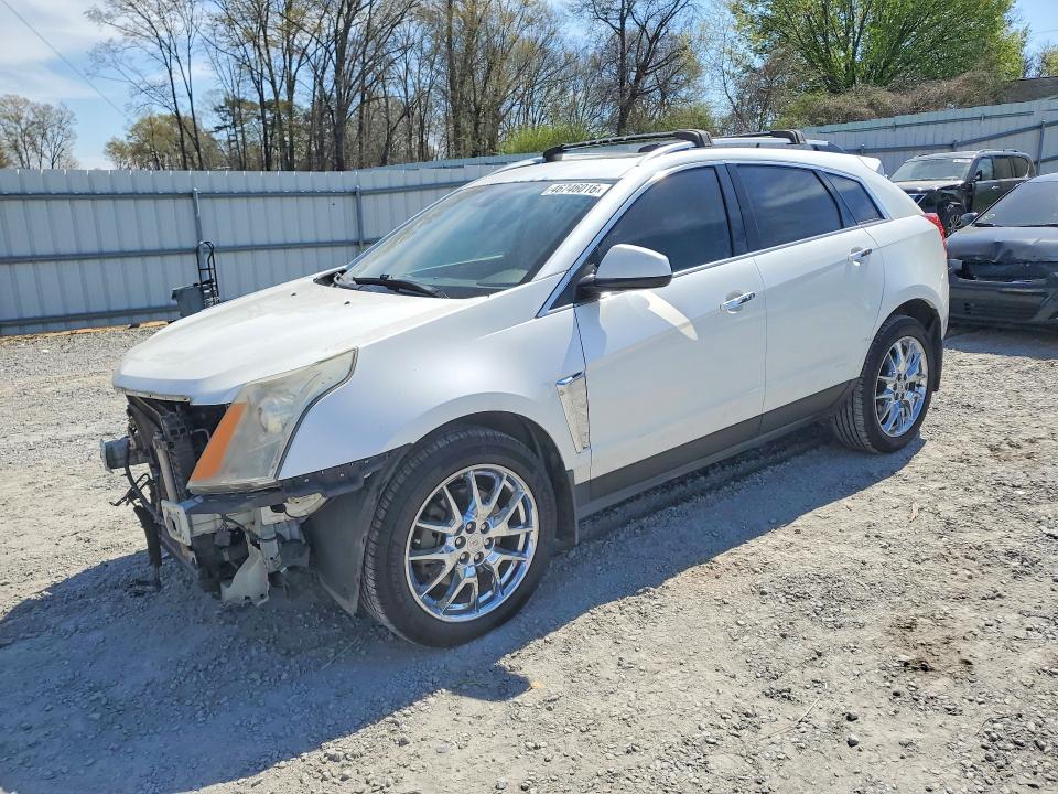 CADILLAC SRX 2013 with VIN 3GYFNDE3XDS637718 - Photo from auction