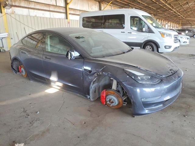 Photo 4 from auction – 2021 TESLA MODEL 3 with VIN 5YJ3E1EC1MF015704