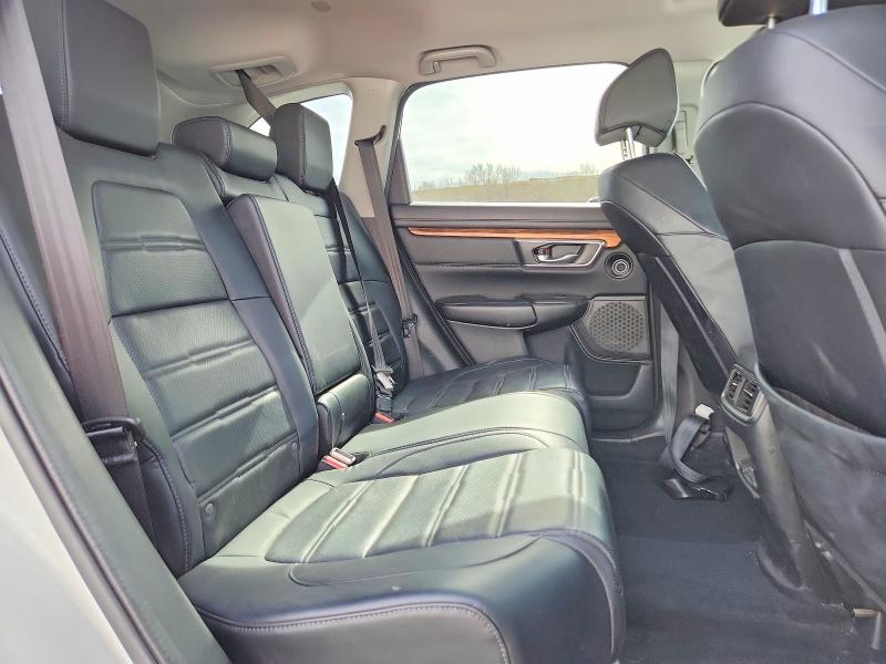 Photo 11 from auction – 2018 HONDA CR-V with VIN 2HKRW2H98JH640840