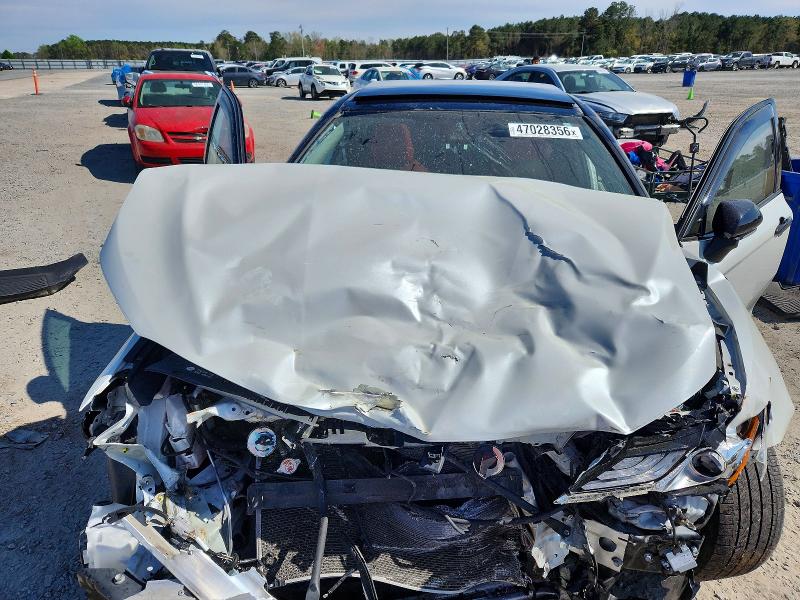 Photo 11 from auction – 2022 TOYOTA CAMRY with VIN 4T1K61AK0NU015722