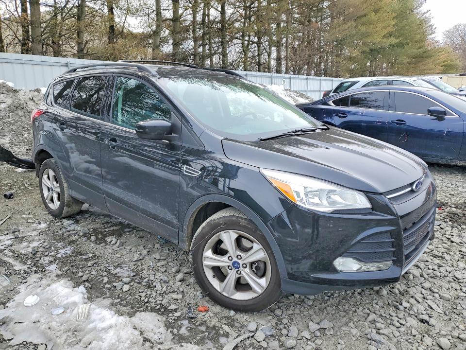 Photo 4 from auction – 2013 FORD ESCAPE with VIN 1FMCU9G92DUD30999
