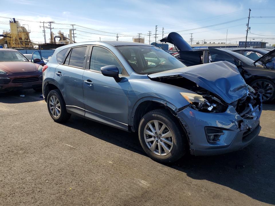 Photo 4 from auction – 2016 MAZDA CX-5 with VIN JM3KE2CY6G0787304
