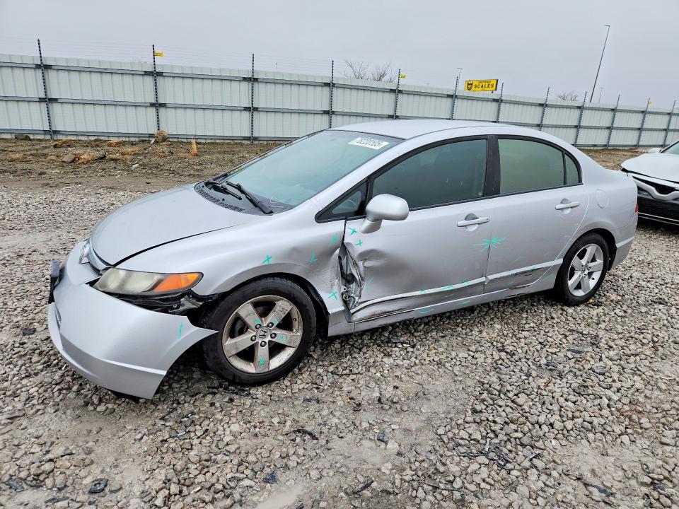 HONDA CIVIC 2010 with VIN 19XFA1F69AE033712 - Photo from auction