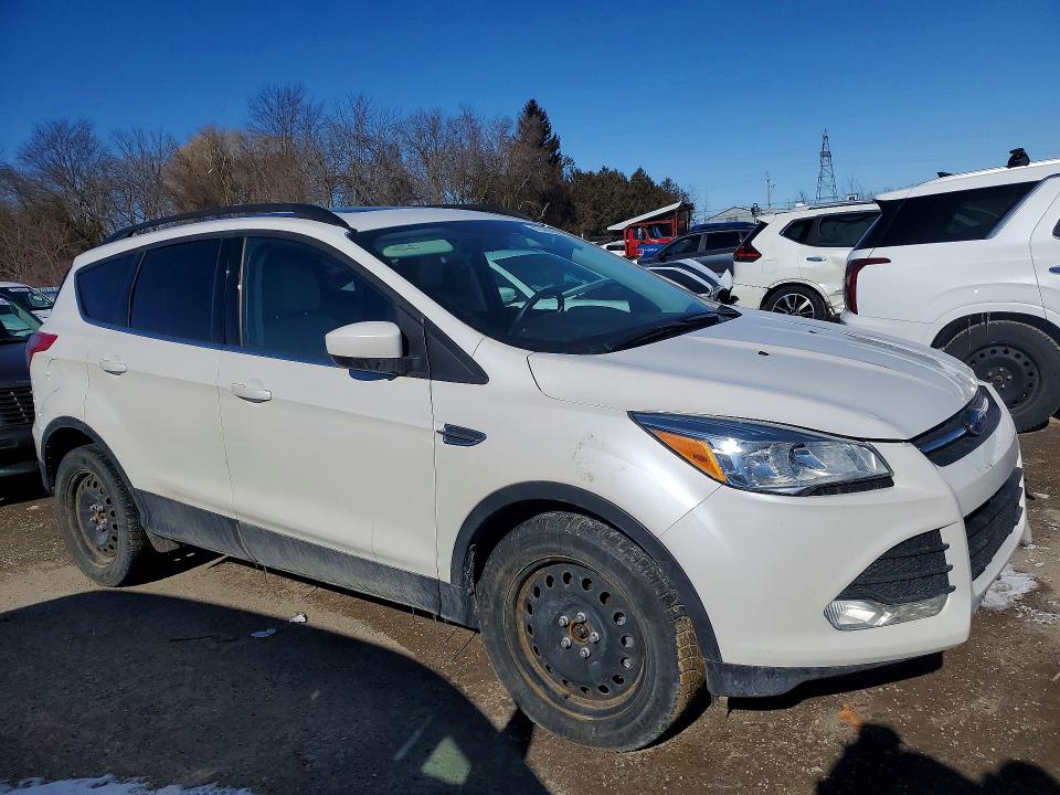 Photo 4 from auction – 2014 FORD ESCAPE with VIN 1FMCU9G98EUE02922