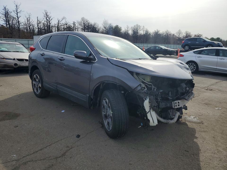 Photo 4 from auction – 2018 HONDA CR-V with VIN 7FARW2H54JE059111