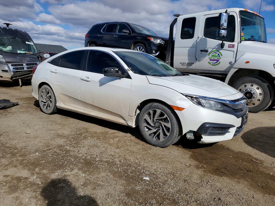 Photo 4 from auction – 2018 HONDA CIVIC with VIN 2HGFC2F75JH531632