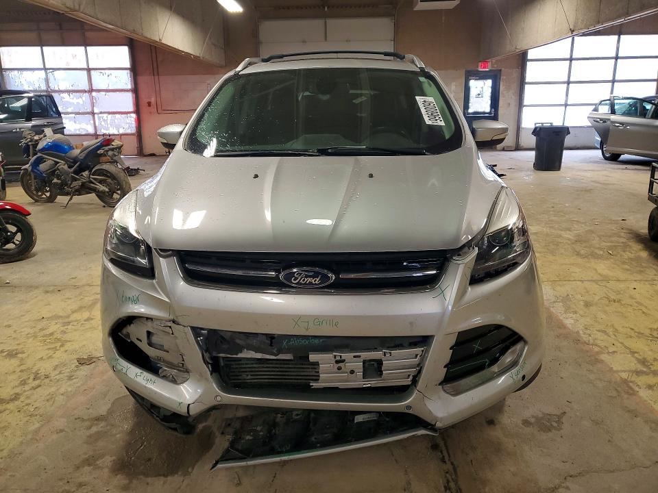 Photo 5 from auction – 2014 FORD ESCAPE with VIN 1FMCU0J98EUB14130