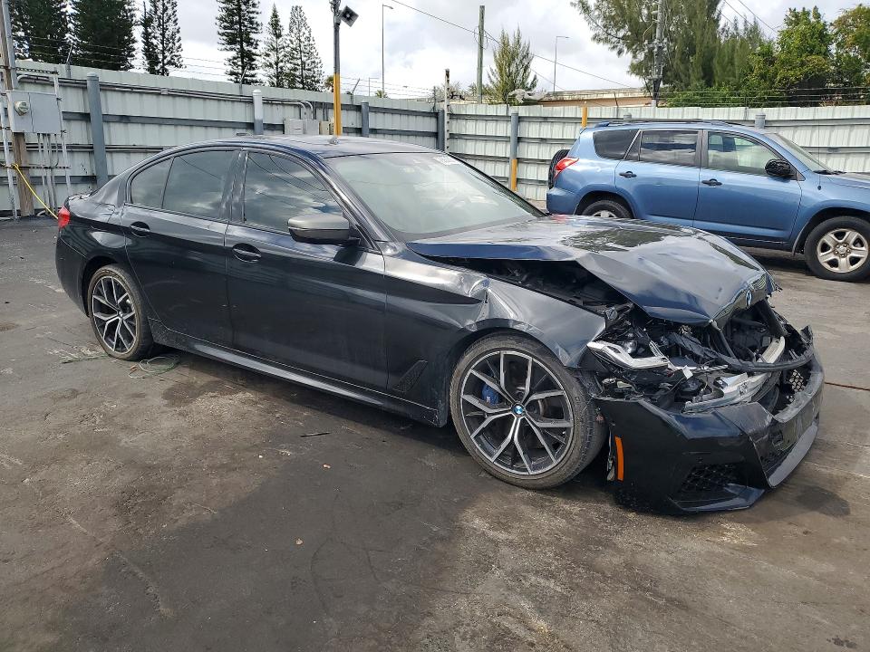 Photo 4 from auction – 2021 BMW M550XI with VIN WBA13BK03MCG26571