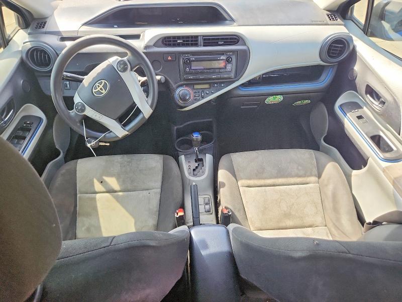 Снимка 8 от търг – 2012 TOYOTA PRIUS C с VIN JTDKDTB35C1007661