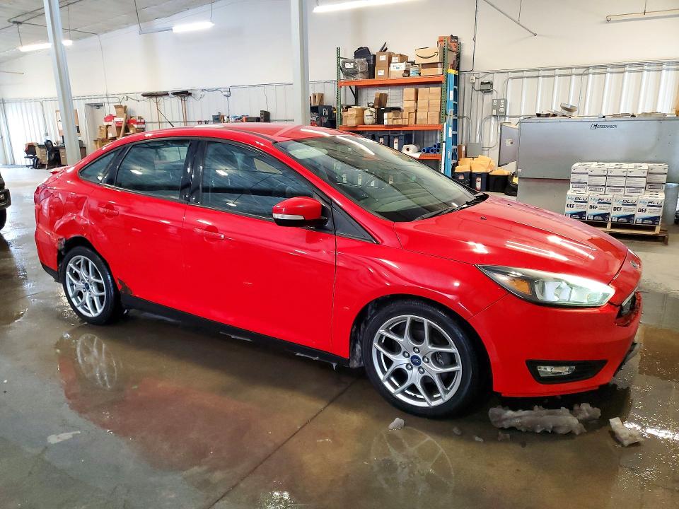 Photo 4 from auction – 2015 FORD FOCUS with VIN 1FADP3F2XFL220668