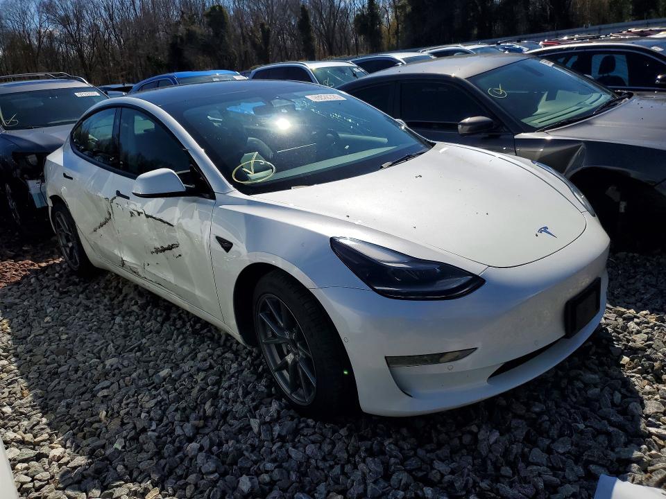 Photo 4 from auction – 2022 TESLA MODEL 3 with VIN 5YJ3E1EAXNF326953
