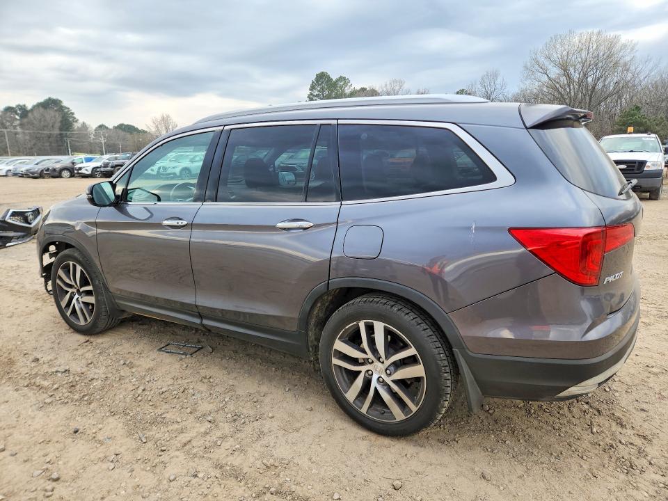 Photo 2 from auction – 2016 HONDA PILOT with VIN 5FNYF5H9XGB029406
