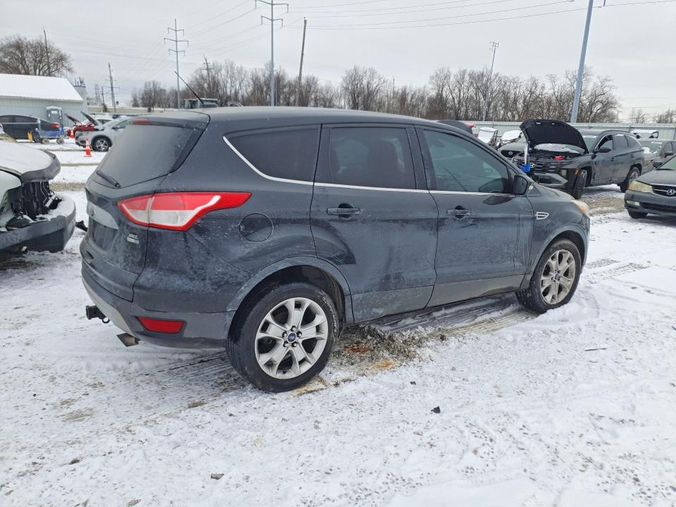 Photo 3 from auction – 2013 FORD ESCAPE with VIN 1FMCU9H92DUC77137