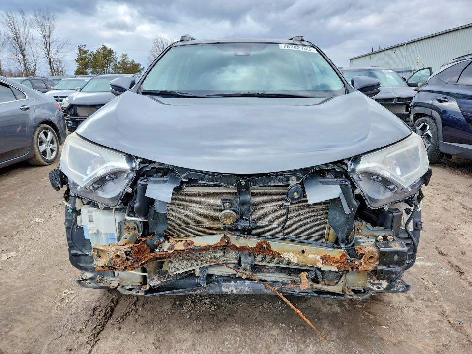 Photo 5 from auction – 2018 TOYOTA RAV4 with VIN 2T3ZFREV0JW512661