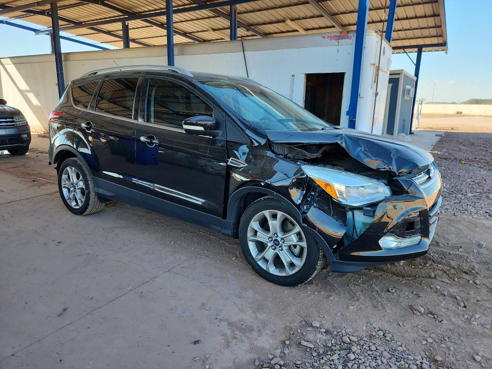 Photo 4 from auction – 2015 FORD ESCAPE with VIN 1FMCU0J9XFUB81572
