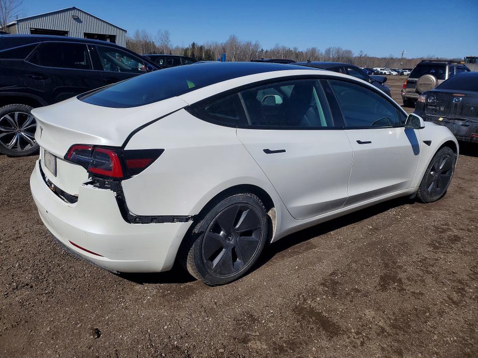 Photo 3 from auction – 2022 TESLA MODEL 3 STANDARD RAN with VIN 5YJ3E1EA6NF168756