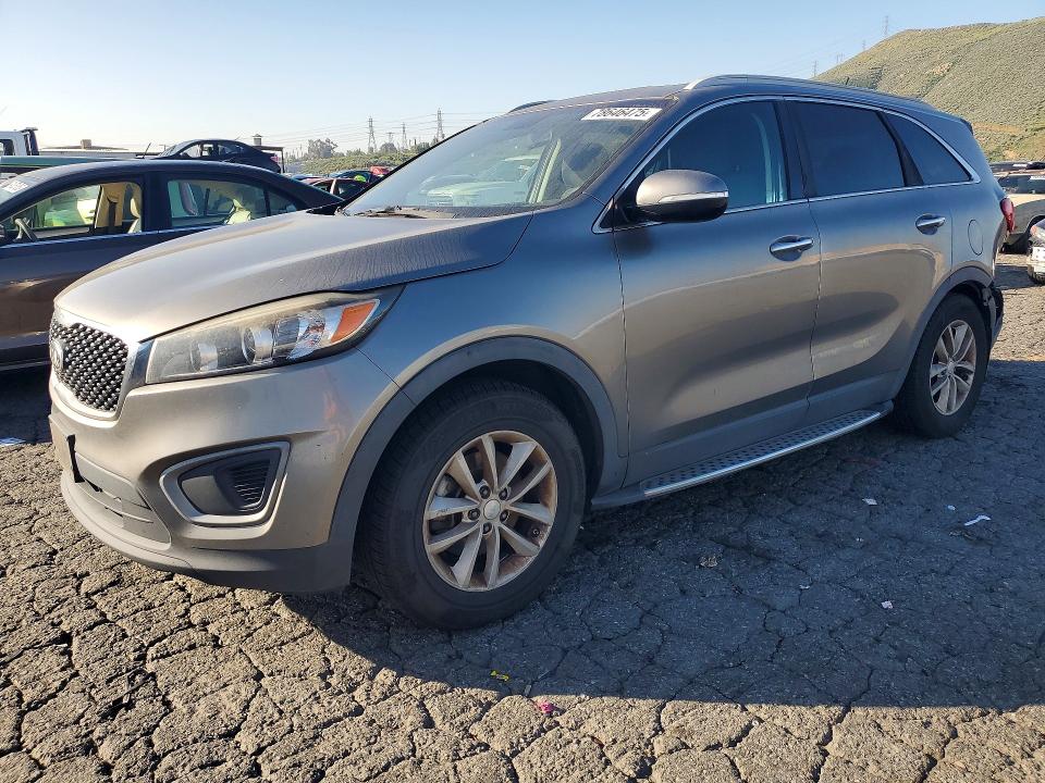 KIA SORENTO 2016 with VIN 5XYPG4A30GG104227 - Photo from auction