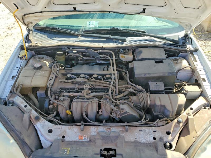 Photo 11 from auction – 2005 FORD FOCUS with VIN 1FAHP36N95W177000