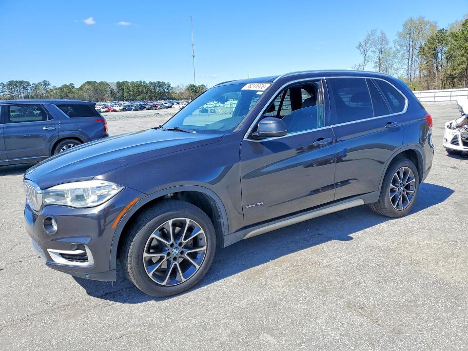 BMW X5 2018 with VIN 5UXKR2C57J0X08859 - Photo from auction