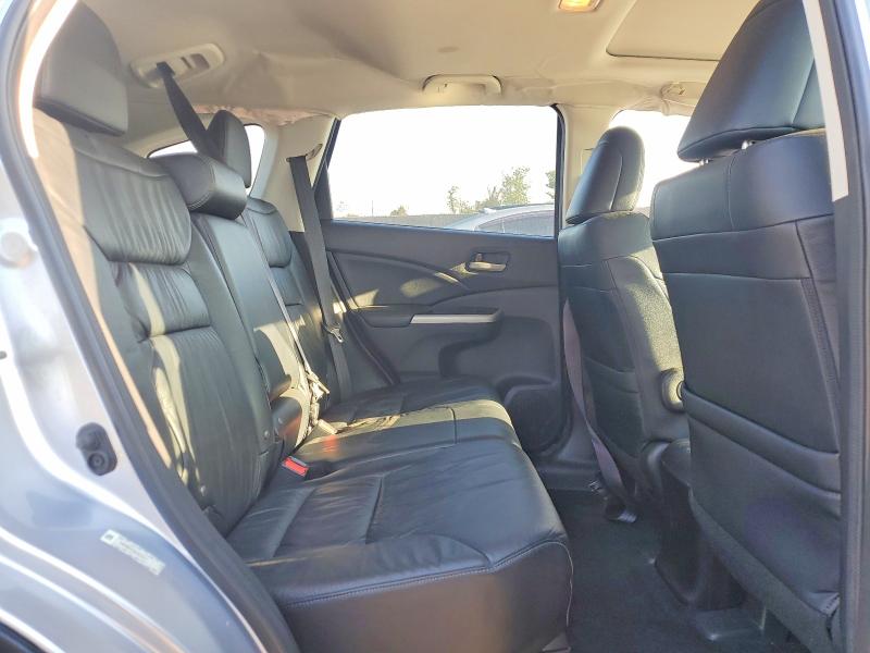 Photo 11 from auction – 2014 HONDA CR-V with VIN 2HKRM3H74EH534577