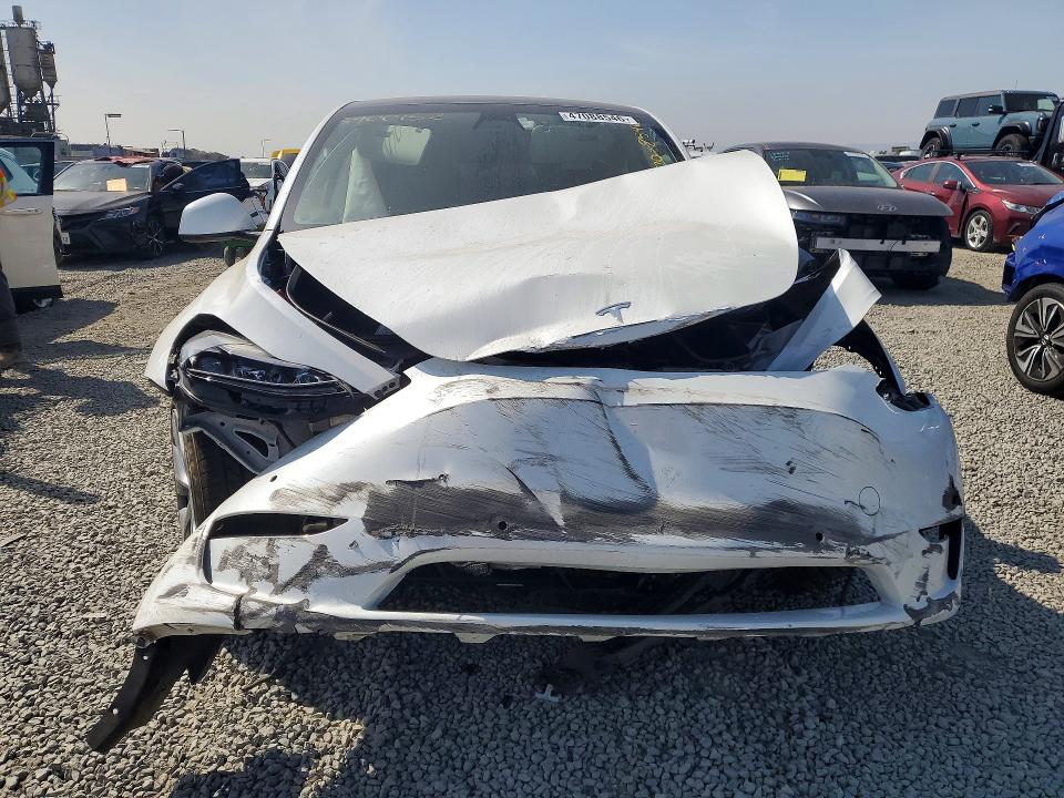 Photo 5 from auction – 2022 TESLA MODEL Y with VIN 7SAYGDEE9NF560508