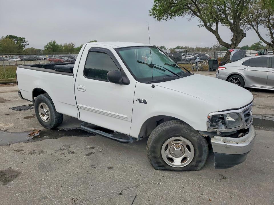 Photo 4 from auction – 2003 FORD F150 with VIN 1FTRF17203NA81625