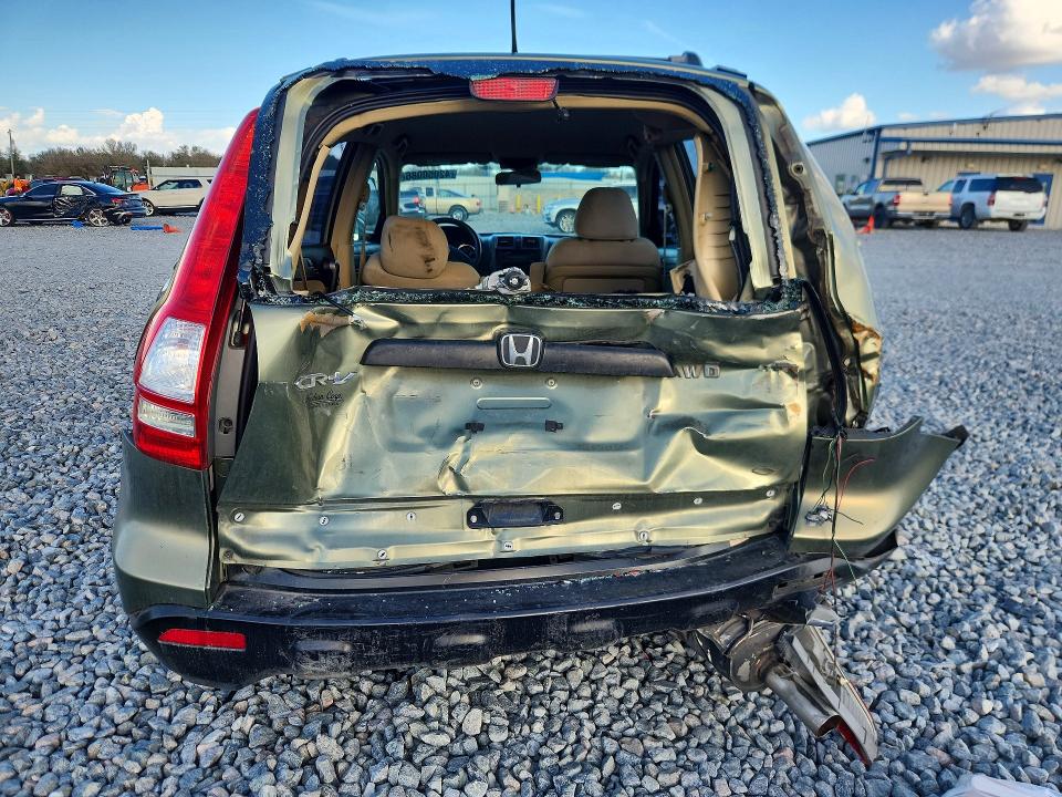 Photo 6 from auction – 2009 HONDA CR-V with VIN 5J6RE48359L054253