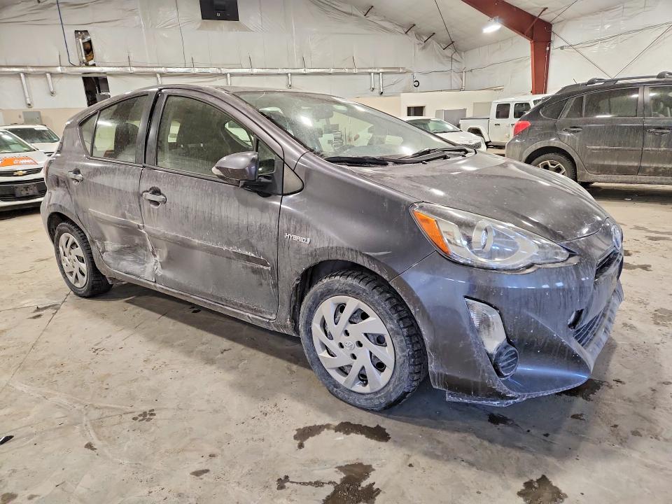 Photo 4 from auction – 2015 TOYOTA PRIUS C with VIN JTDKDTB37F1107748
